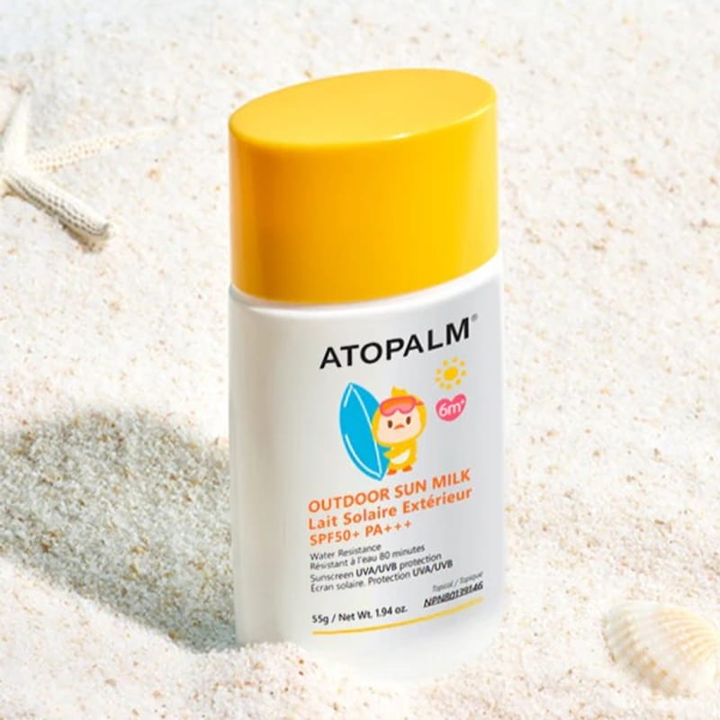 Bottle in sand for Atopalm Outdoor Sun Milk SPF50+ PA++++ (55 grams)
